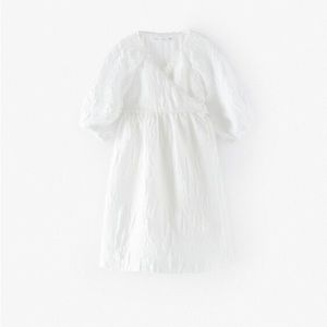 White puff sleeve textured cross over dress never worn